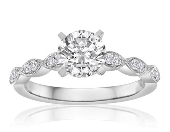 platinum round brilliant diamond solitaire ring with marquise diamond set shoulders 1001982