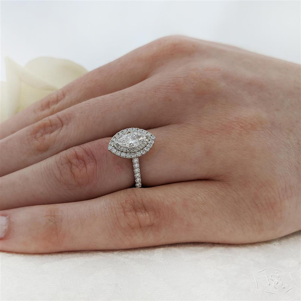 marquise cut diamond in a platinum cluster diamond band