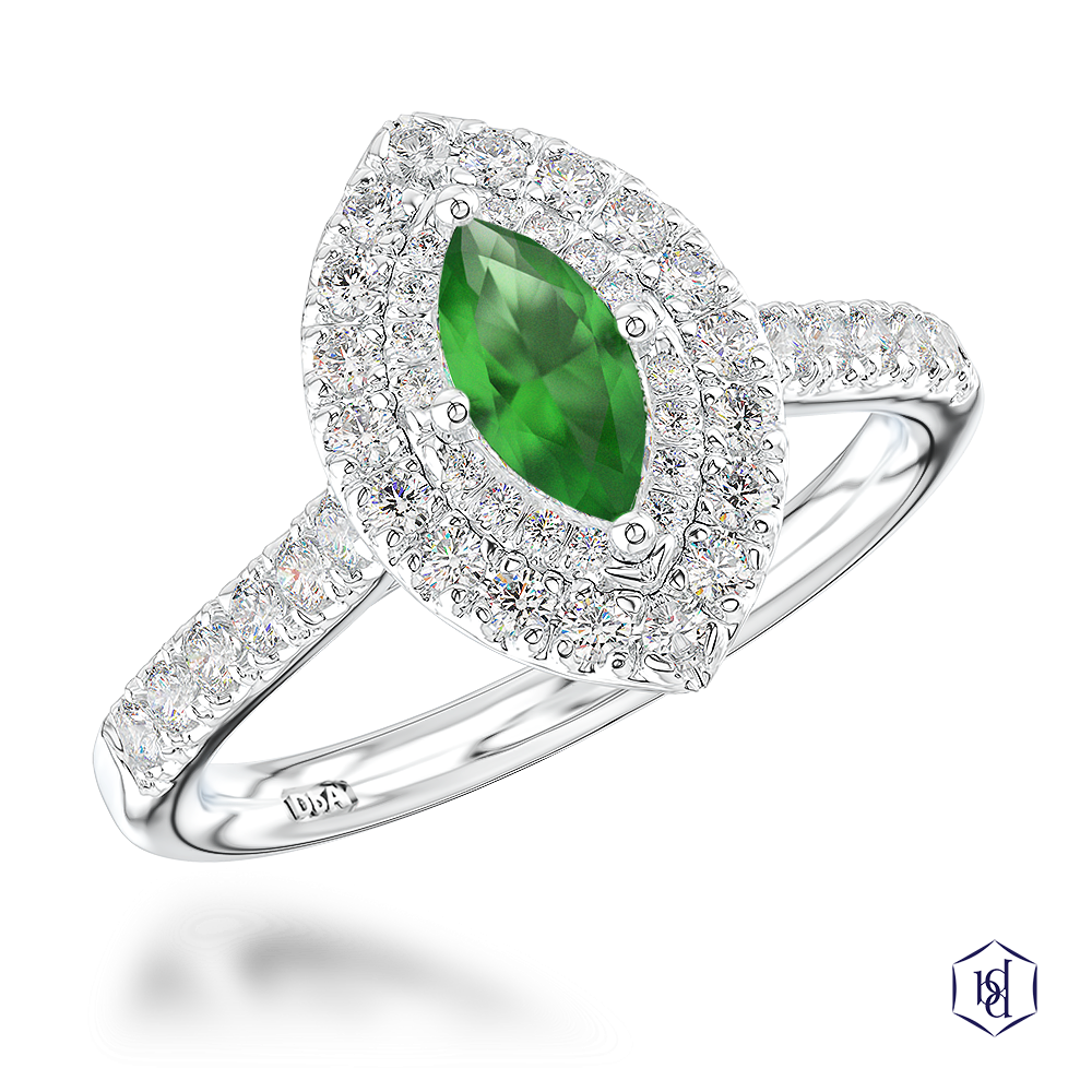 marquise cut green tourmaline in a platinum cluster diamond band