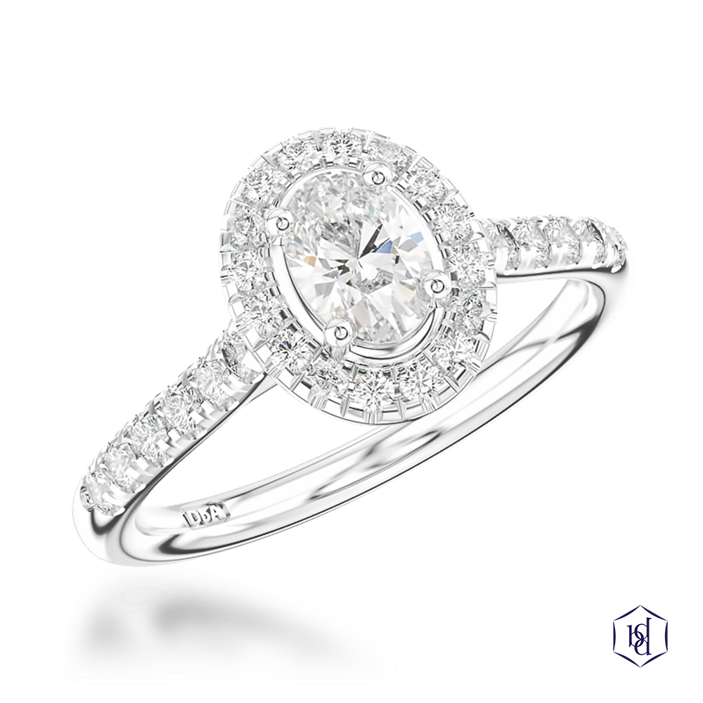 oval cut diamond in a platinum cluster diamond band