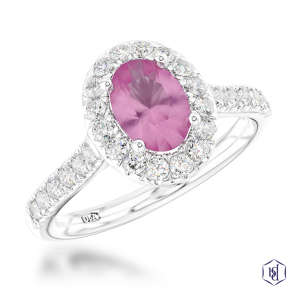 oval cut pink sapphire in a platinum cluster diamond band