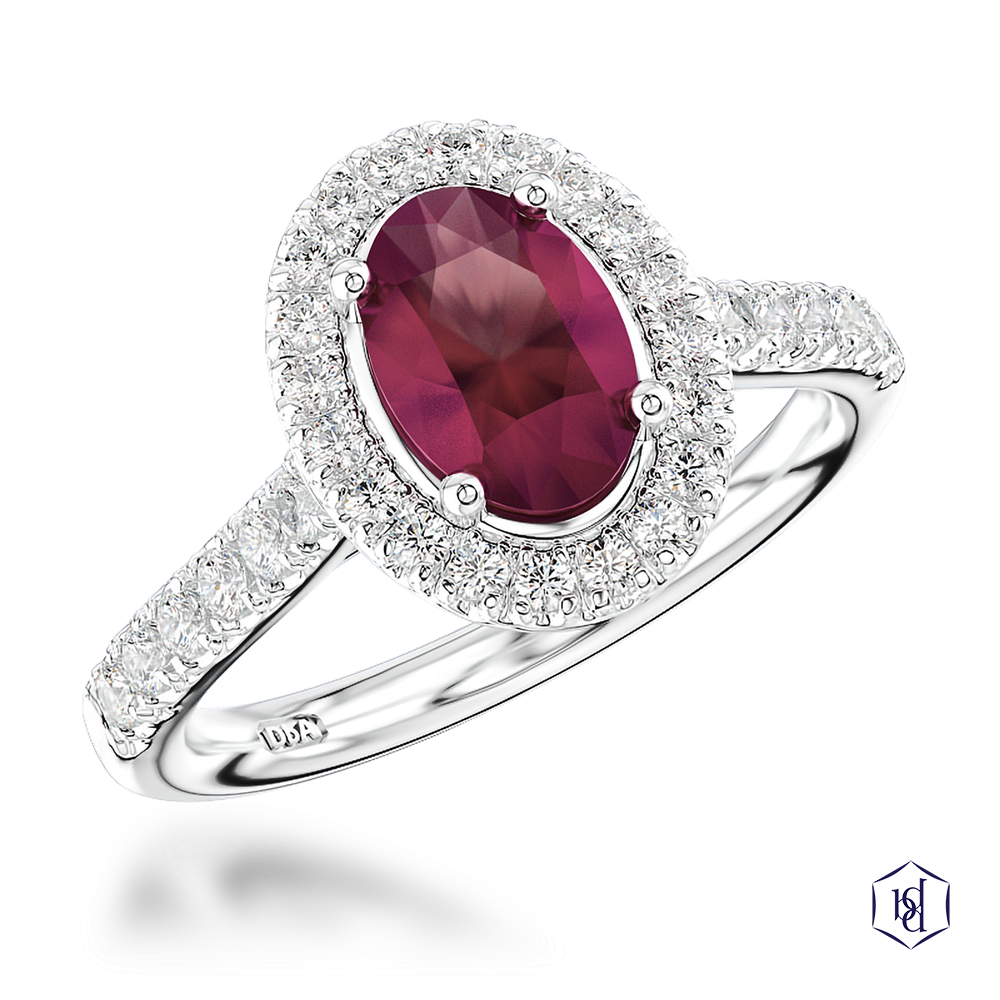 oval cut ruby in a platinum cluster diamond band