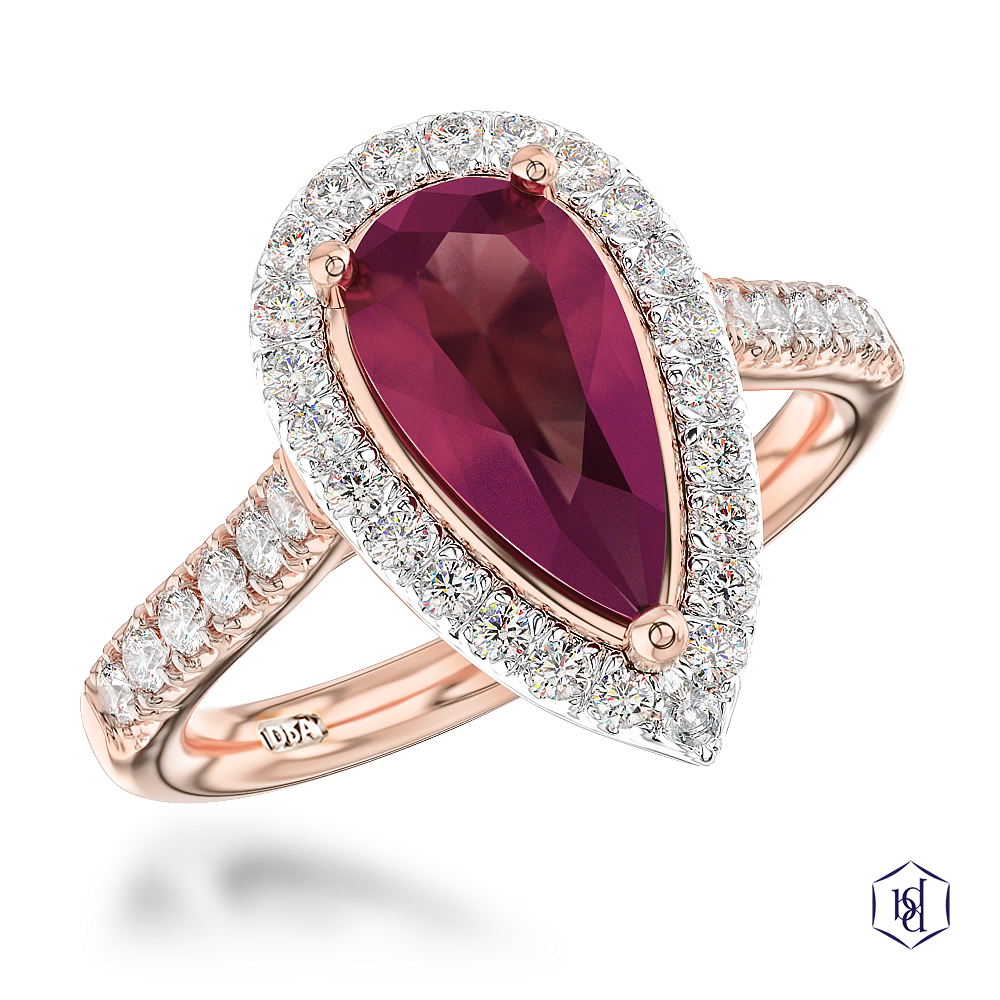 pear shape cut ruby in a 18ct rose gold shank and platinum head cluster diamond band