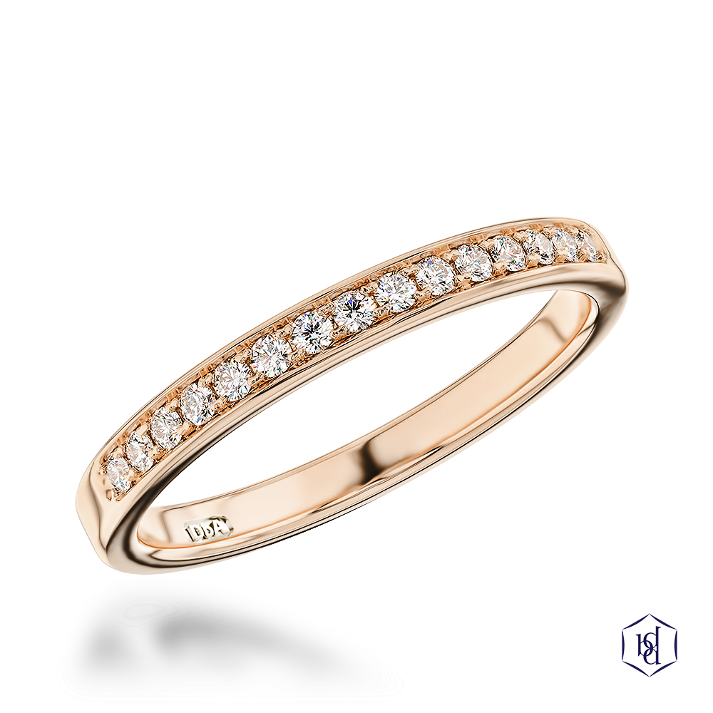 round brilliant cut diamond in a 18ct rose gold bridal diamond band