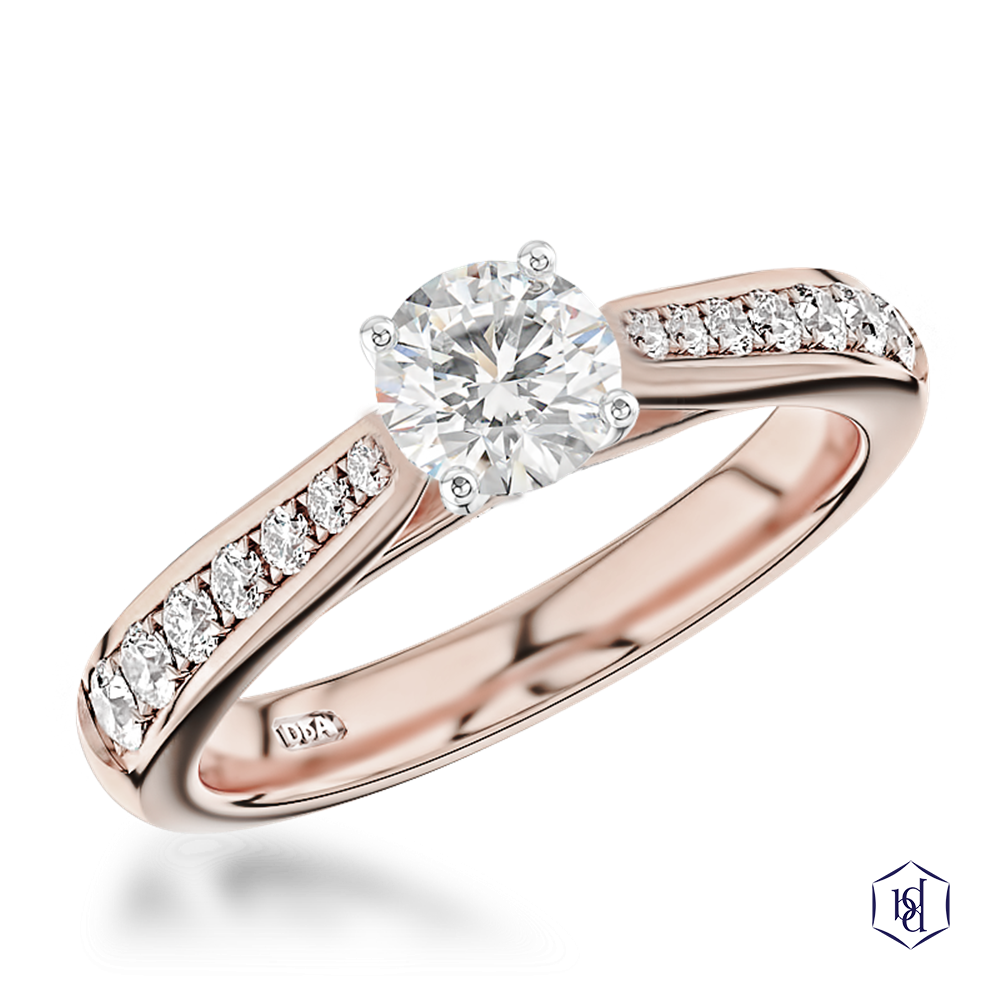round brilliant cut diamond in a 18ct rose gold shank and platinum head solitaire diamond band