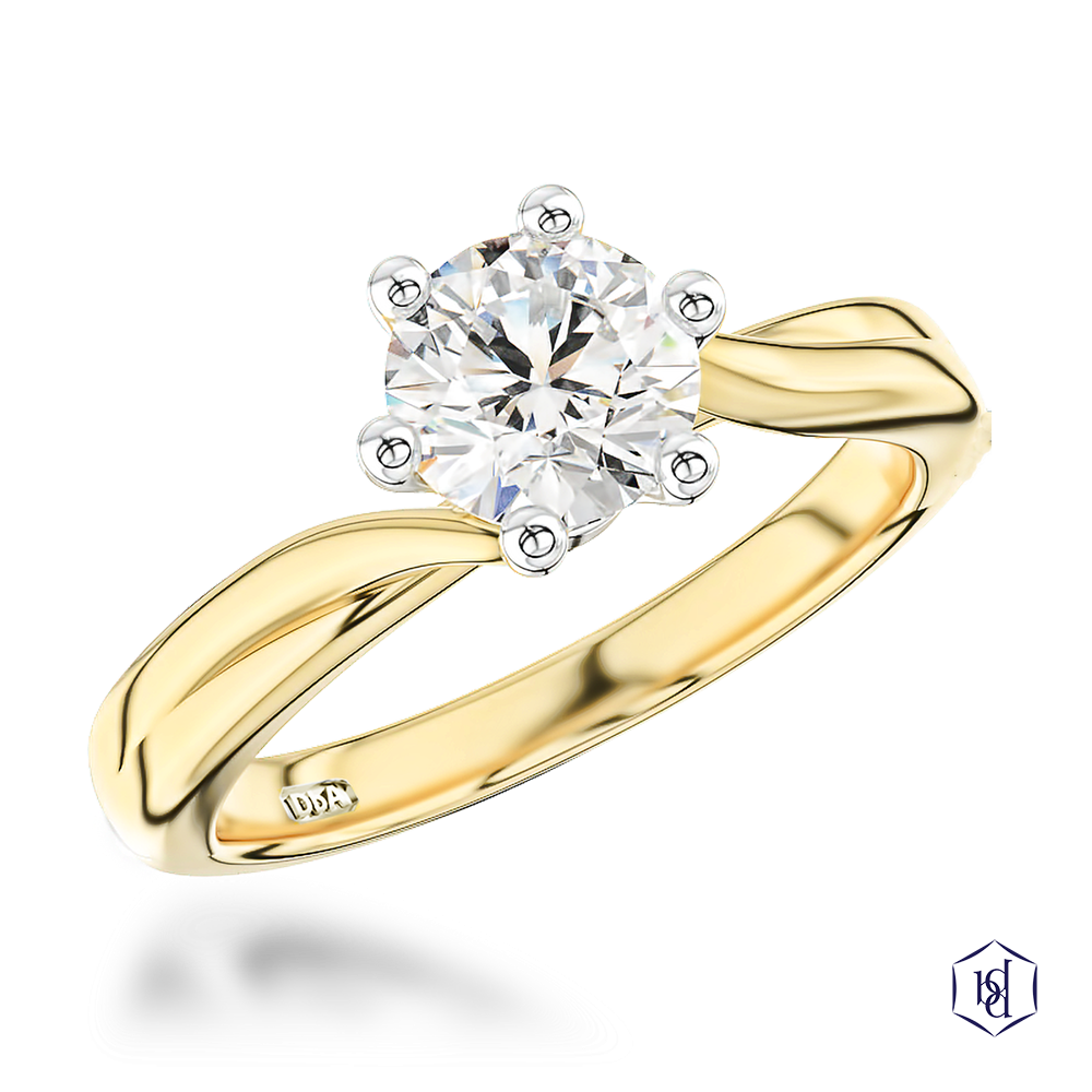 round brilliant cut diamond in a 18ct yellow gold shank and platinum head solitaire plain band