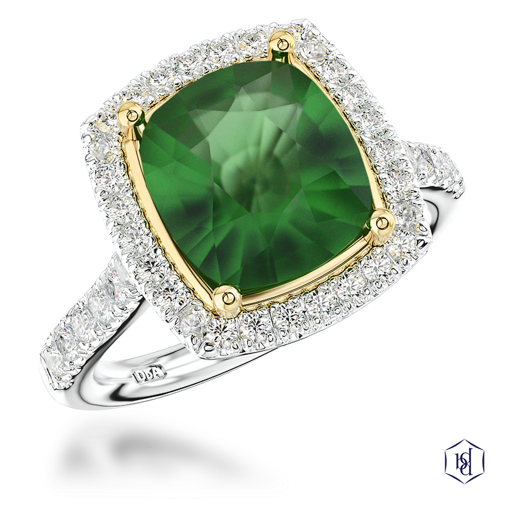 cushion cut green tourmaline in a platinum shank and18ct yellow gold head cluster claw set