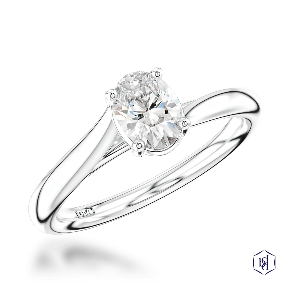 oval cut diamond in a platinum solitaire plain band